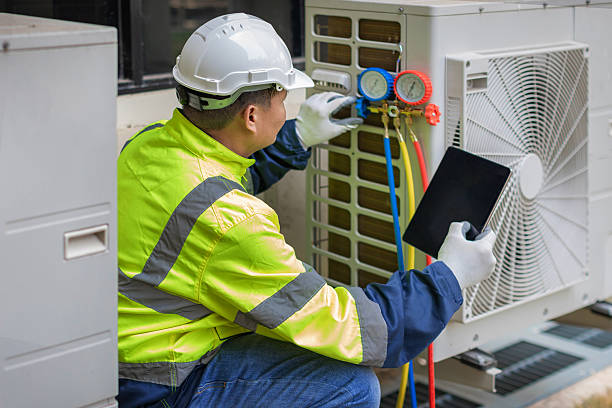 Professional Emergency Ac Repair technician working in Middleport, NY
